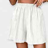 Pantalons Curts Elegants amb Plecs