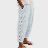Rea - Relaxa't en pantalons de xandall a ratlles