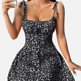 Vestit mini de dona amb estampat floral i tirants lligats