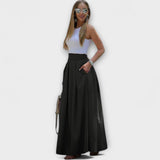 Tzafira – Elegant faldilla maxi amb cintura alta