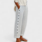 Rea - Relaxa't en pantalons de xandall a ratlles