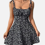 Vestit mini de dona amb estampat floral i tirants lligats