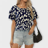 Evelyn - Blusa diària amb escot rodó