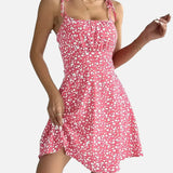 Vestit mini de dona amb estampat floral i tirants lligats