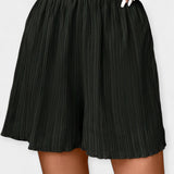 Pantalons Curts Elegants amb Plecs