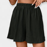 Pantalons Curts Elegants amb Plecs