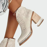 Botas de cuir brodades