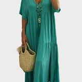 Linnea – Vestit maxi suau amb volants i escot en forma de V