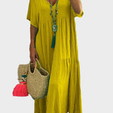 Linnea – Vestit maxi suau amb volants i escot en forma de V