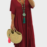 Linnea – Vestit maxi suau amb volants i escot en forma de V