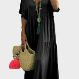 Linnea – Vestit maxi suau amb volants i escot en forma de V