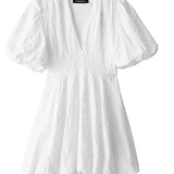 Vestit curt de dona amb mànigues bufades i detall texturitzat