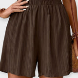 Pantalons Curts Elegants amb Plecs