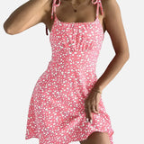 Vestit mini de dona amb estampat floral i tirants lligats