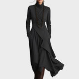 Teresa - Vestit maxi de punt asimètric amb coll alt